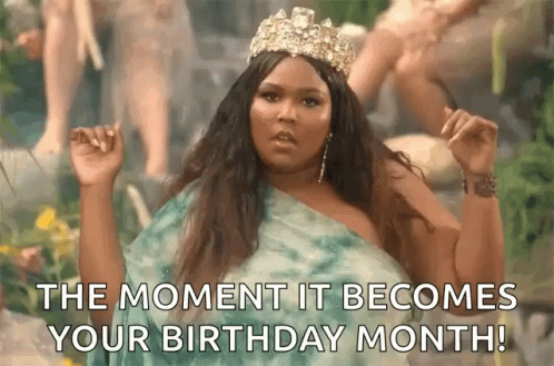 A Woman Wearing A Tiara Is Standing In Front Of A Waterfall And Says The Moment It Becomes Your Birthday Month . GIF
