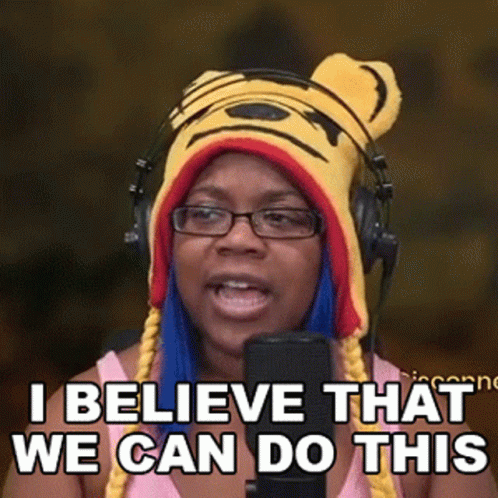 A Woman Wearing A Tiger Hat And Headphones Says I Believe That We Can Do This GIF