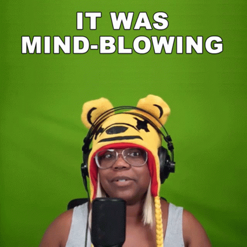 A Woman Wearing A Tiger Hat And Headphones Says " It Was Mind Blowing " GIF