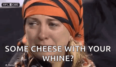 A Woman Wearing A Tigers Headband Is Crying And Asking For Some Cheese With Her Whine . GIF