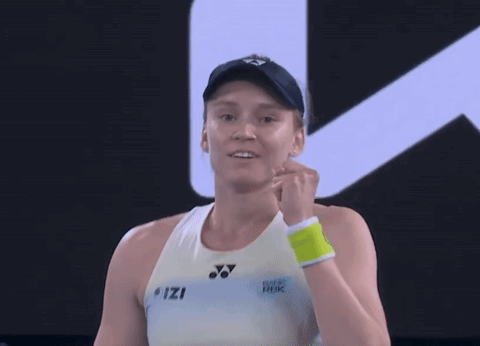 A Woman Wearing A Visor With A Yonex Logo On It Is Smiling GIF