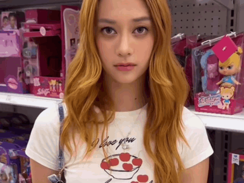 A Woman Wearing A White Shirt That Says I Love You GIF
