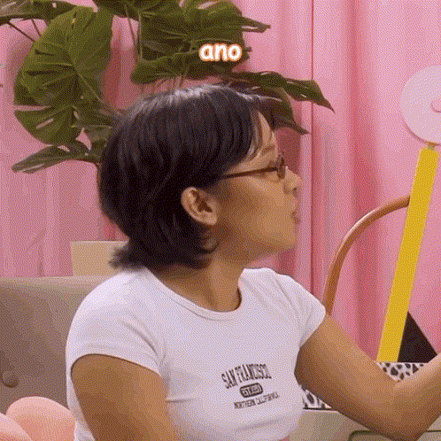 A Woman Wearing A White Shirt That Says San Francisco GIF