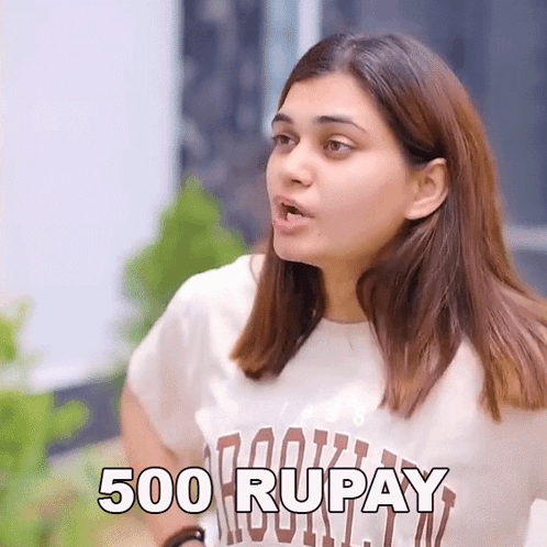 A Woman Wearing A White T-Shirt That Says 500 Rupay GIF