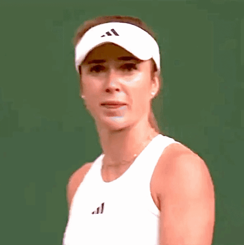 A Woman Wearing A White Tank Top And An Adidas Hat GIF