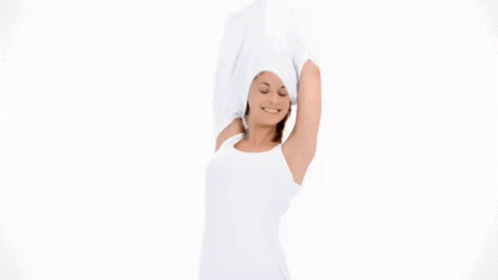 A Woman Wearing A White Tank Top Has 48H Protection Written On Her Underarm GIF