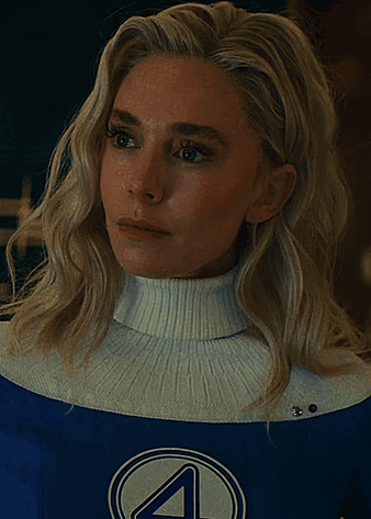 A Woman Wearing A White Turtleneck And A Blue Superhero Costume With The Letter 4 On It GIF