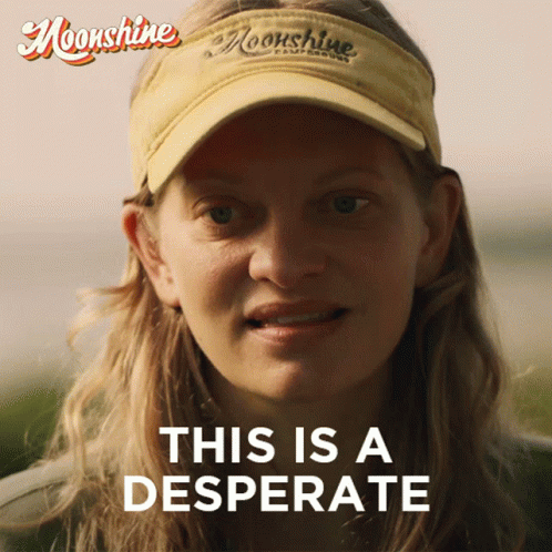 A Woman Wearing A Yellow Moonshine Visor Says " This Is A Desperate " GIF