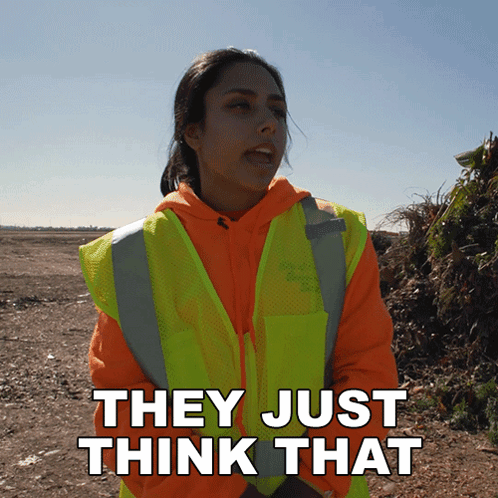 A Woman Wearing A Yellow Vest And An Orange Hoodie Says They Just Think That GIF