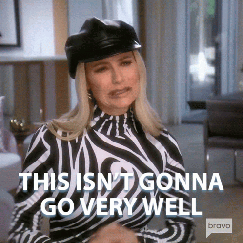 A Woman Wearing A Zebra Print Top And A Black Hat Says This Isn 'T Gonna Go Very Well GIF