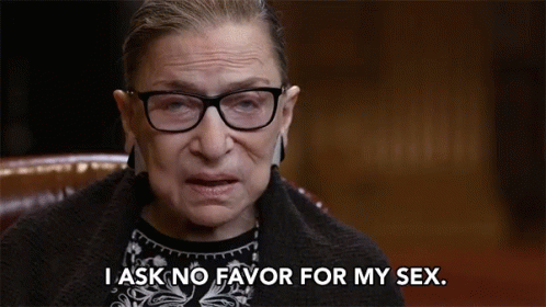 A Woman Wearing Glasses And A Black Sweater Says I Ask No Favor For My Sex GIF