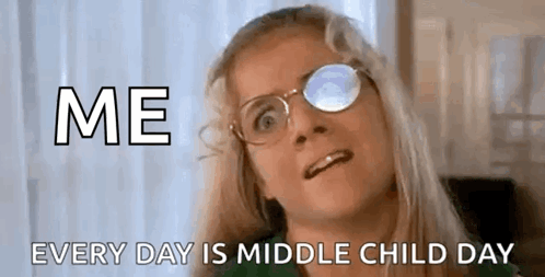 A Woman Wearing Glasses And A Green Shirt Is Making A Funny Face And Saying `` Me Every Day Is Middle Child Day '' . GIF