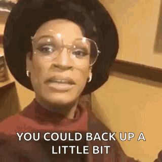 Woman Wearing Glasses And Hat Saying You Could Back Up GIF