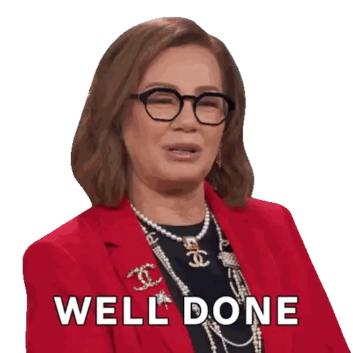 a woman wearing glasses and a red jacket has the words well done on her face