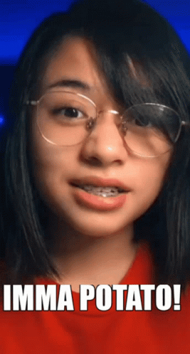 A Woman Wearing Glasses And A Red Shirt Has The Words Imma Potato Written On Her Face GIF
