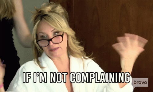 A Woman Wearing Glasses And A White Robe Says If I 'M Not Complaining GIF