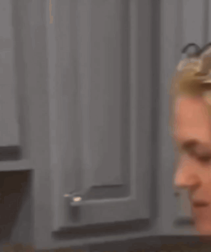 A Woman Wearing Glasses Has The Words And Swallow It On Her Face GIF