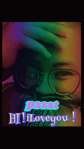A Woman Wearing Glasses Is Covering Her Face With Her Hand And The Words Pssst Hi Love You GIF