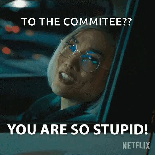 A Woman Wearing Glasses Is Driving A Car And Says To The Committee You Are So Stupid ! GIF