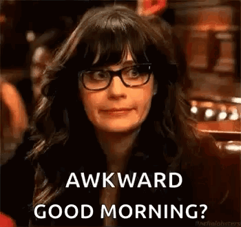 A Woman Wearing Glasses Is Making A Funny Face And Saying `` Awkward Good Morning ? '' GIF