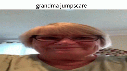 A Woman Wearing Glasses Is Making A Funny Face And The Caption Says Grandma Jumpscare GIF