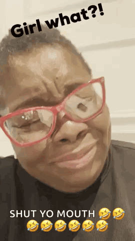A Woman Wearing Glasses Is Making A Funny Face With The Words Girl What ? Shut Yo Mouth . GIF
