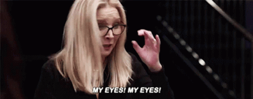 A Woman Wearing Glasses Is Screaming And Saying " My Eyes My Eyes " GIF
