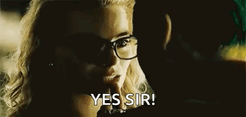 Woman In Glasses Talking To Man In Movie GIF