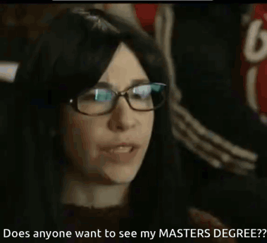 A Woman Wearing Glasses Says Does Anyone Want To See My Masters Degree GIF