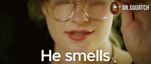 A Woman Wearing Glasses Says He Smells GIF