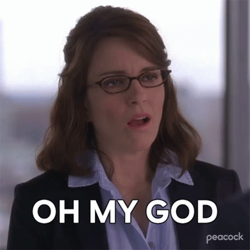 A Woman Wearing Glasses Says Oh My God GIF