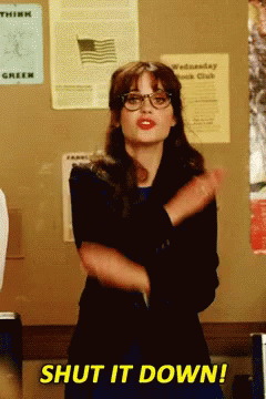 A Woman Wearing Glasses Says Shut It Down While Dancing GIF