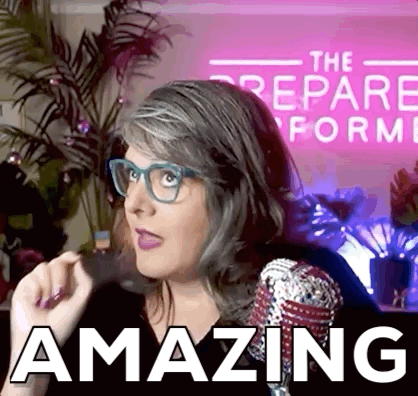 A Woman Wearing Glasses Stands In Front Of A Pink Sign That Says " The Prepare Form " GIF