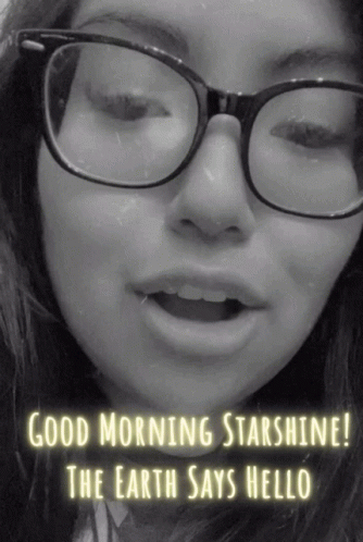 A Woman Wearing Glasses With The Words Good Morning Starshine The Earth Says Hello Below Her GIF