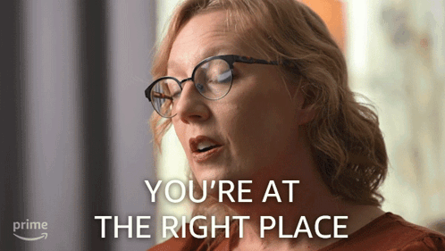 a woman wearing glasses with the words you 're at the right place above her