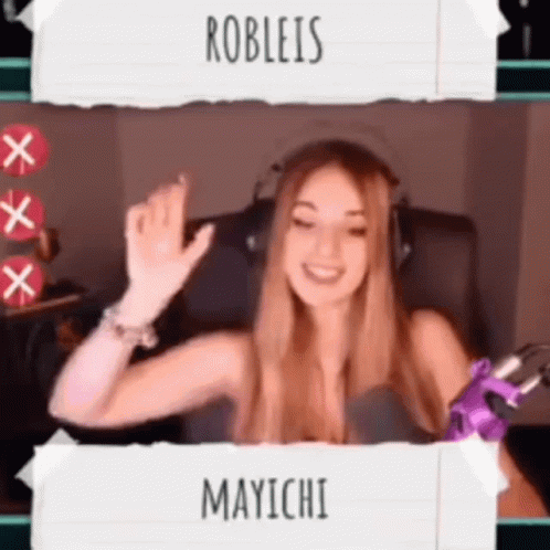 A Woman Wearing Headphones And A Purple Glove With Robleis And Mayichi Written On The Bottom GIF
