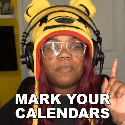 A Woman Wearing Headphones And A Winnie Pooh Hat Says Mark Your Calendars GIF