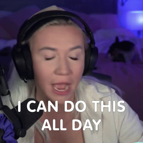 A Woman Wearing Headphones Is Saying I Can Do This All Day GIF