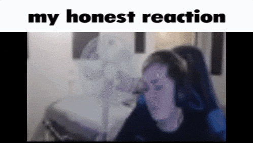 a woman wearing headphones is sitting in front of a fan with the words " my honest reaction " above her