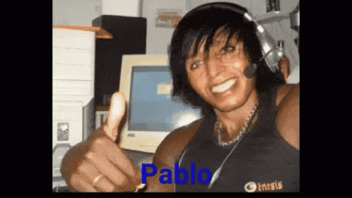 A Woman Wearing Headphones Is Smiling And Giving A Thumbs Up With The Name Pablo On The Bottom Right GIF