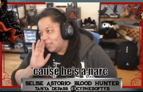 a woman wearing headphones says ' cause he 's a narc '
