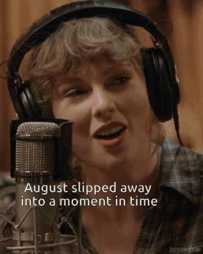 A Woman Wearing Headphones Singing Into A Microphone With The Words August Slipped Away Into A Moment In Time GIF