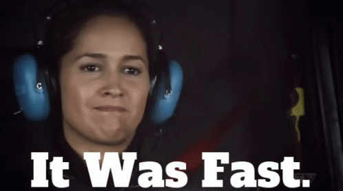 A Woman Wearing Headphones With The Words " It Was Fast " Below Her GIF