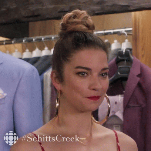 Woman With Hoop Earrings And #Schittscreek GIF