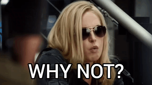 A Woman Wearing Sunglasses And A Black Jacket Is Asking Why Not ? GIF