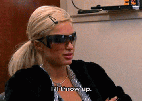 A Woman Wearing Sunglasses And A Fur Coat Is Saying I 'Ll Throw Up . GIF