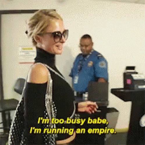 A Woman Wearing Sunglasses And A Turtleneck Says I 'M Too Busy Babe I 'M Running An Empire GIF