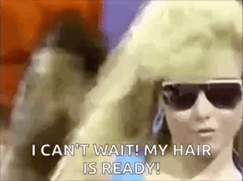 A Woman Wearing Sunglasses And A Wig Says `` I Can 'T Wait My Hair Is Ready ! '' GIF