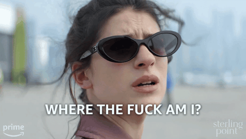 a woman wearing sunglasses is asking where the fuck am