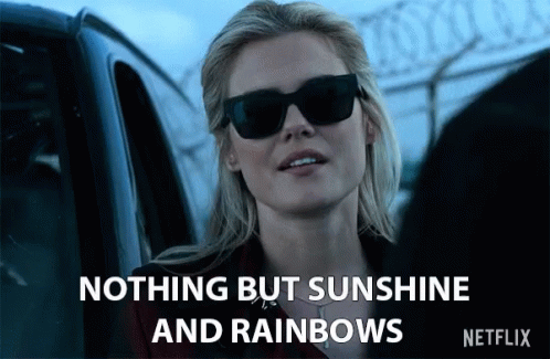 A Woman Wearing Sunglasses Says Nothing But Sunshine And Rainbows On A Netflix Ad GIF